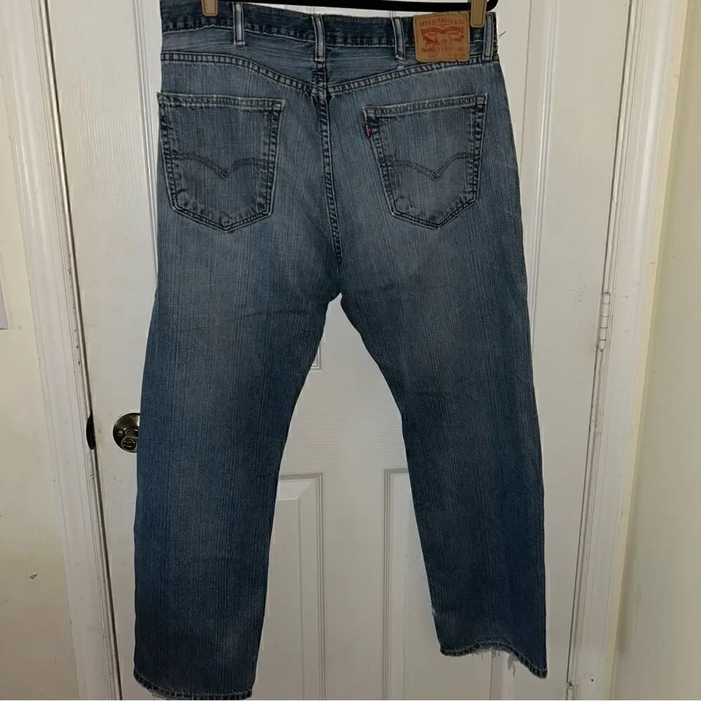 Levi’s 505 Distressed Denim Jeans